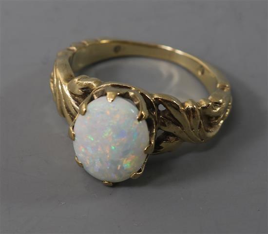 A 9ct? gold and white opal dress ring, size I.
